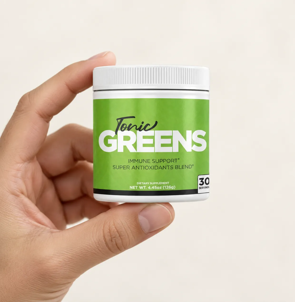 TonicGreens — the package held in a hand